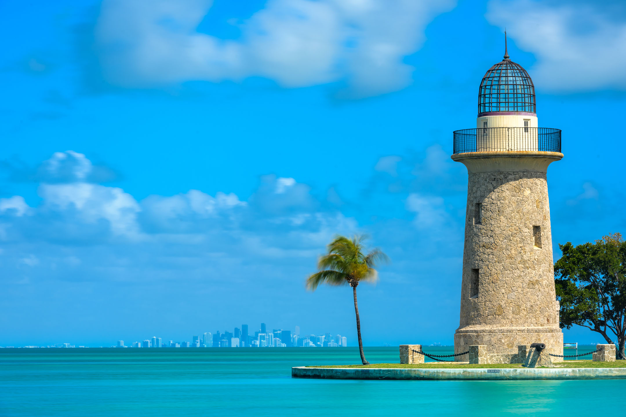Biscayne_Bay-Boca Chita Lighthouse and Miami Skyline on calm day_1733878310 Biscayne Bay Boca Chita Lighthouse And Miami Skyline On Calm Day