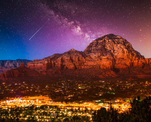 Grand Canyon Milk Way Galaxy Over Mountains Of Sedona Arizona With Illuminated City Lights Below