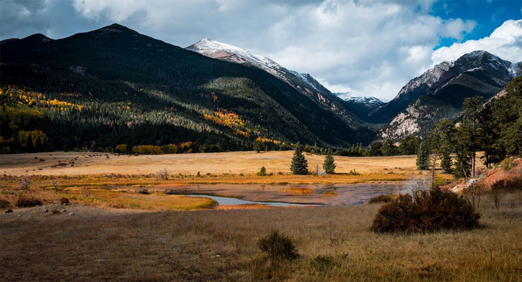 a, tranquil, mountain, landscape, under, cloudy, sky Aspire Tours A Tranquil Mountain Landscape Under