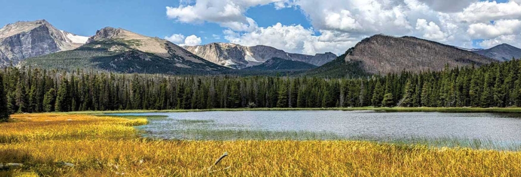 two, friends, discussing, a, hiking, trail, near, finch, lake Aspire Tours Mountain Meadow Pond