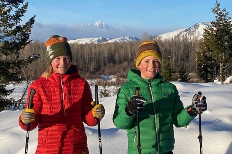 two, kids, smiling, while, snowshoeing, in, winter Backcountrysafarisjh Two Kids Smiling While Snowshoeing