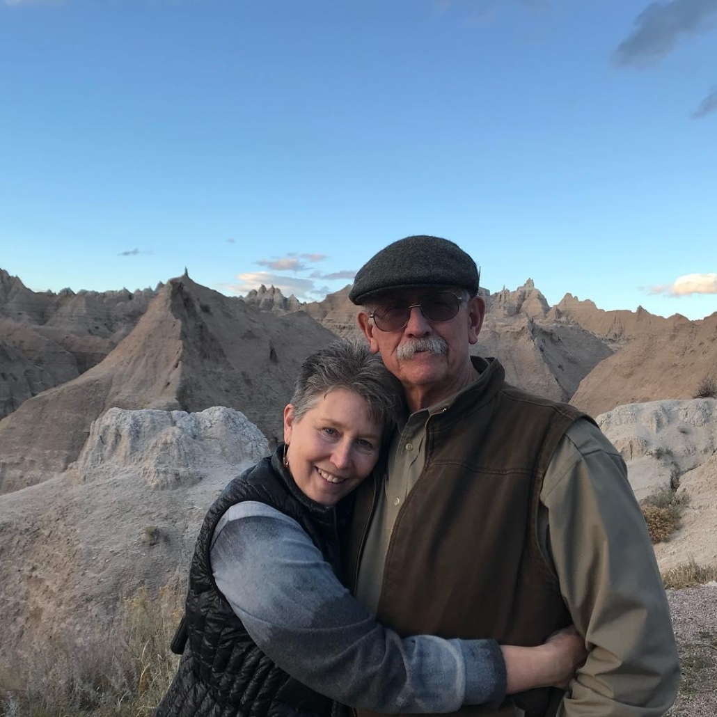 blackhillsadventuretours_couple-badlands-hike-sunset Blackhillsadventuretours Couple Badlands Hike Sunset