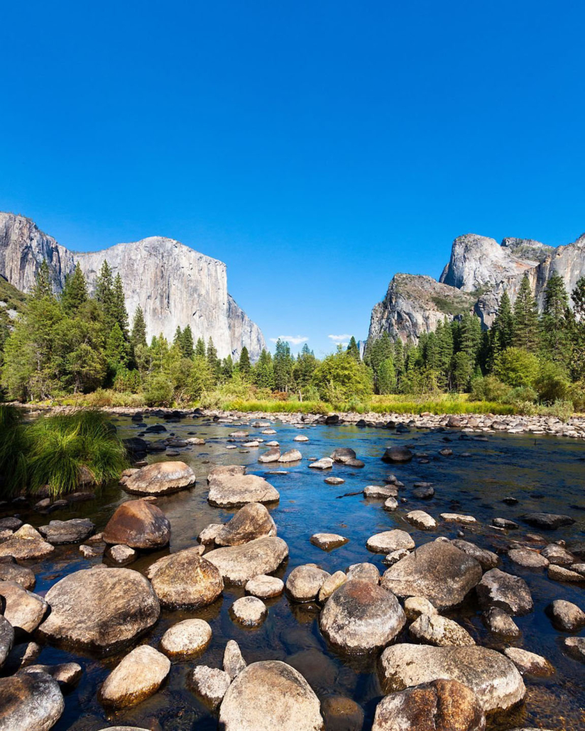 calitrips_yosemite-river-stones-tall-cliffs Calitrips Yosemite River Stones Tall Cliffs