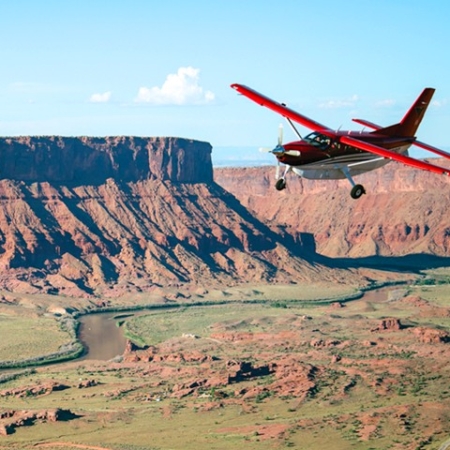 Canyonlandsbynight A Small Aircraft Flying Over