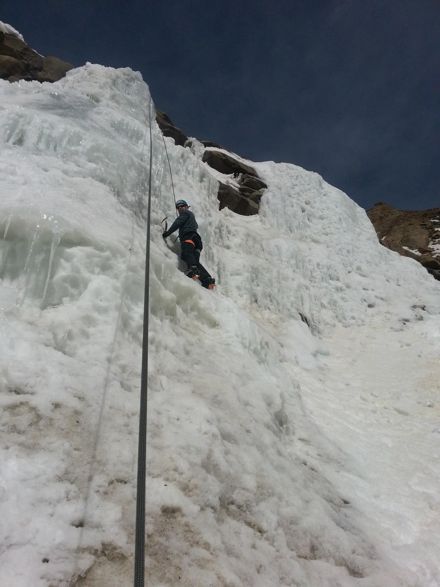scaling, an, icy, cliff, face Coclimbing Scaling An Icy Cliff Face