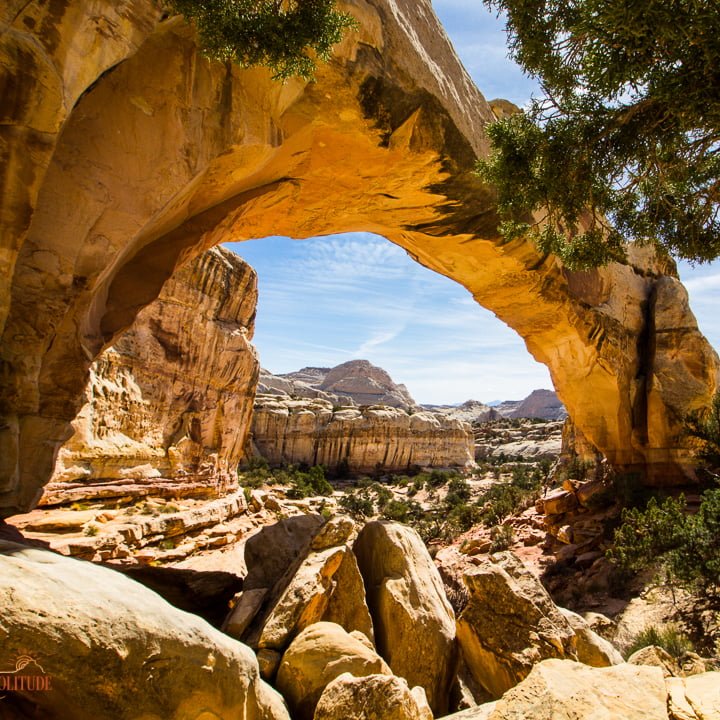 Sandstone arch in a desert landscape Desert Solitude  Day Bryce Canyon Capitol Reef Goblin Valley Arch Desert Canyon