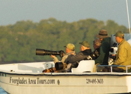 Everglades Boattours Birdwatchers On A Boat Capturing