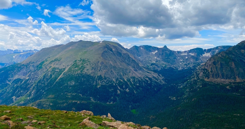 vast, mountain, landscape, under, a, cloudy, sky Explorerdenvertours Vast Mountain Landscape Under A
