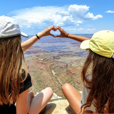 Gctouring Two Friends Making A Heart