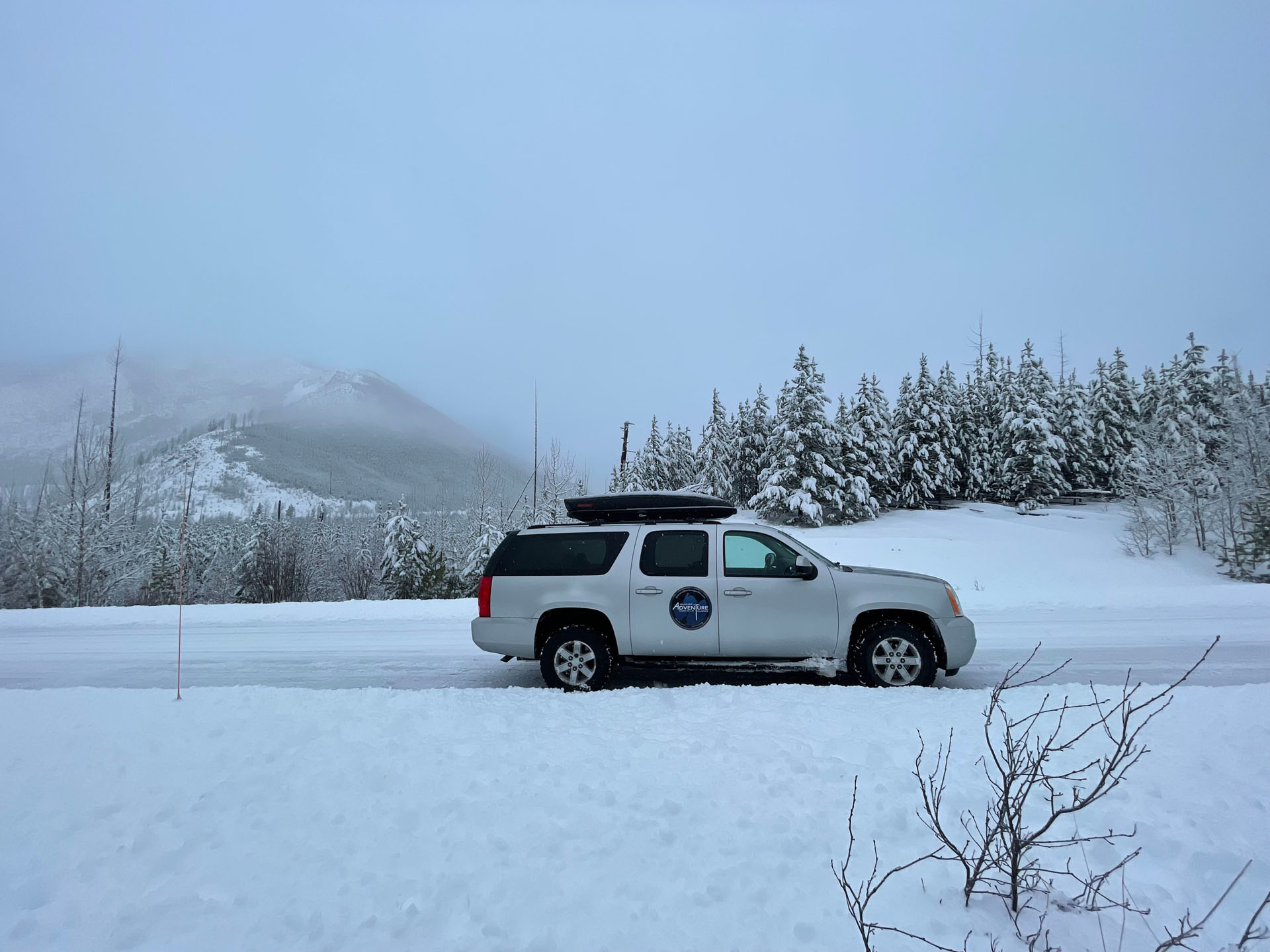 glacieradventureguides_snowy-vehicle-glacier-park Glacieradventureguides Snowy Vehicle Glacier Park