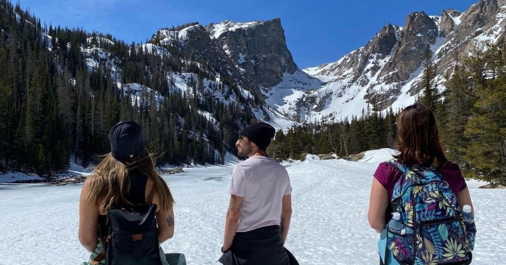 three, hikers, admiring, a, snowy, mountain, view Gobirdingman Three Hikers Admiring A Snowy