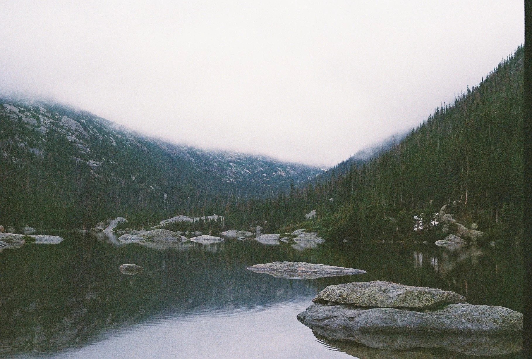a, serene, lake, surrounded, by, misty, mountains Goodmountainadventures A Serene Lake Surrounded By