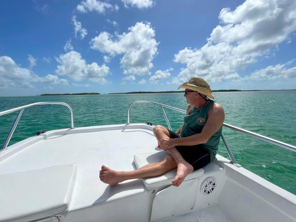 goodtimeskeywest_man-relaxing-boat-dry-tortugas Goodtimeskeywest Man Relaxing Boat Dry Tortugas