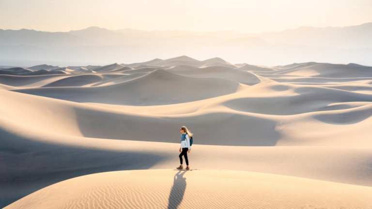 Death Valley and Mojave Desert VIP Tour From Las Vegas — Death Valley Marvittours Woman Walking Sand Dunes Death Valley