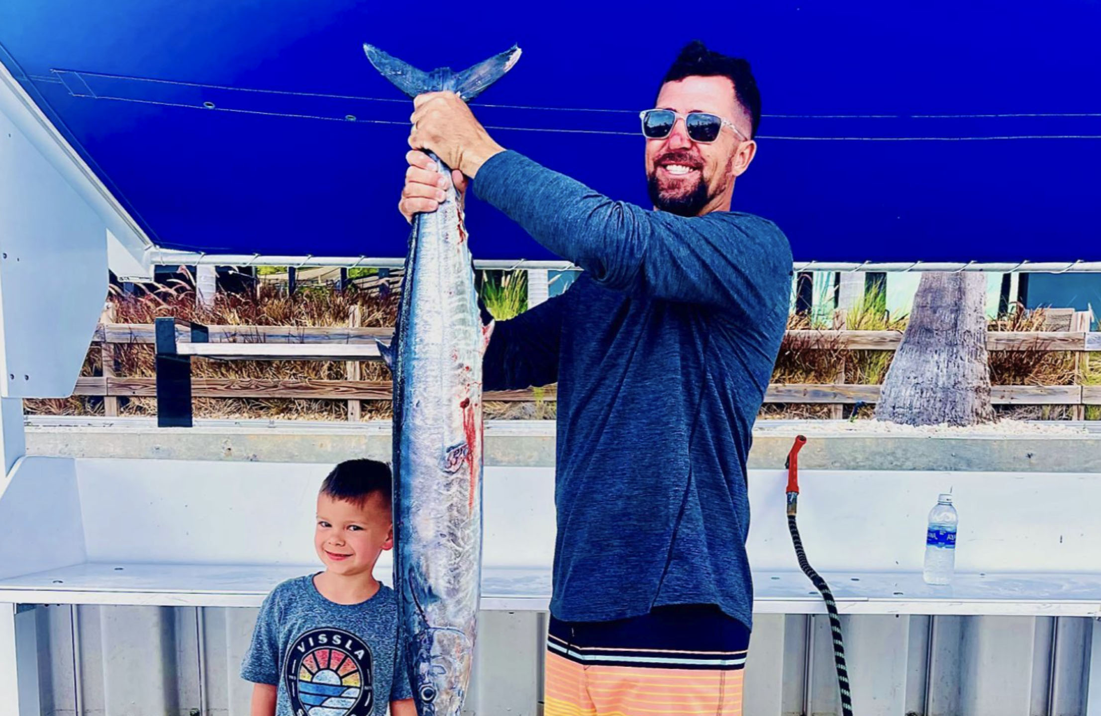 redkeyfishingcharters-fishing-prize-holding-man Redkeyfishingcharters Fishing Prize Holding Man