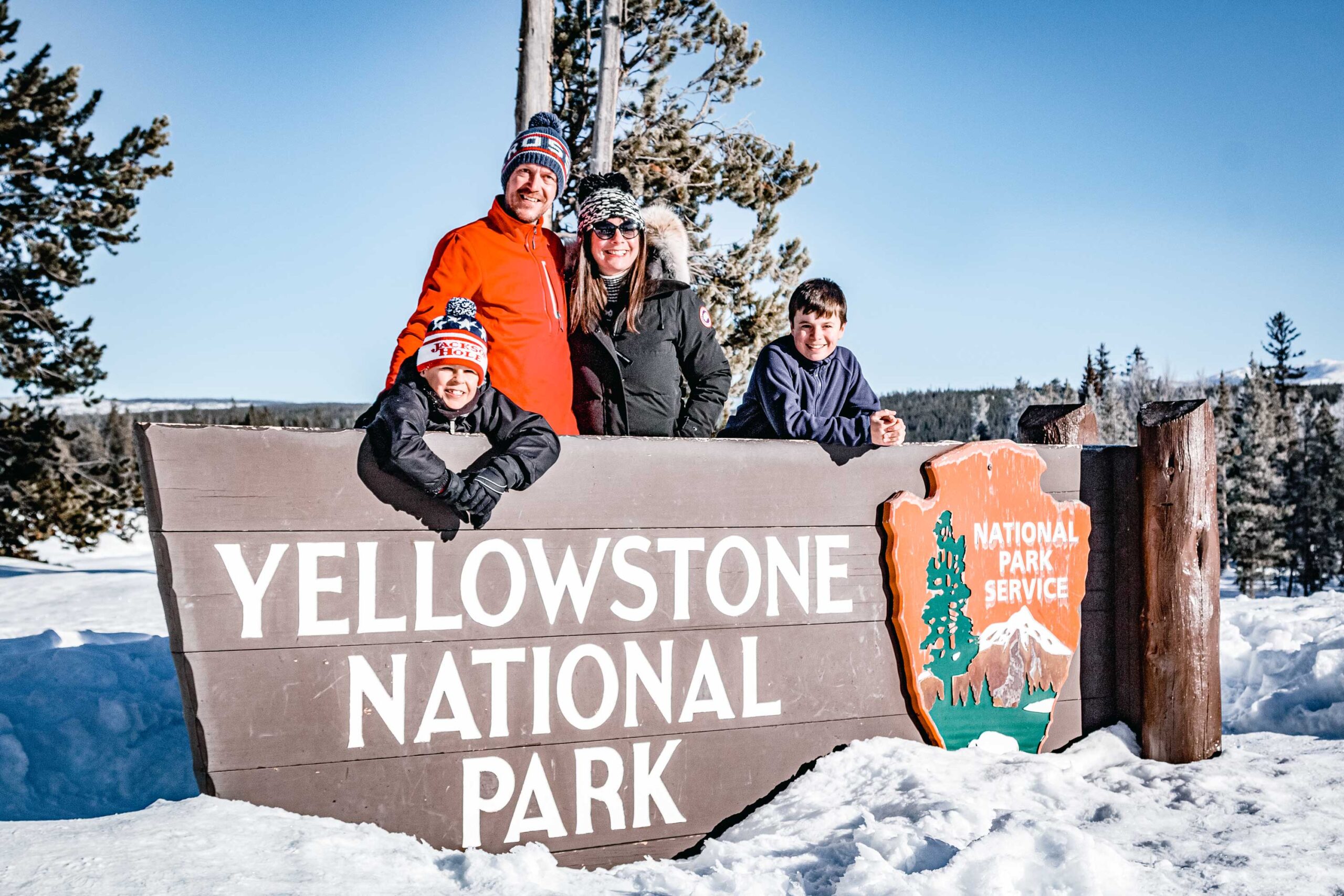 Yellowstone Snowcoach Tour • Old Faithful — Yellowstone Scenicsafariswinter Family W Sign Yellowstone Snowmobile Wyoming
