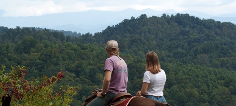 couple, taking, in, the, mountain, view, on, horseback Smokymountaintrailrides Couple Taking In The Mountain
