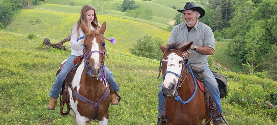 two, riders, enjoying, a, scenic, trail Smokymountaintrailrides Two Riders Enjoying A Scenic