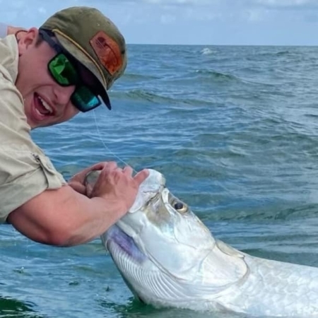 Straycatfishingcharters Man Holding Huge Fish In Water