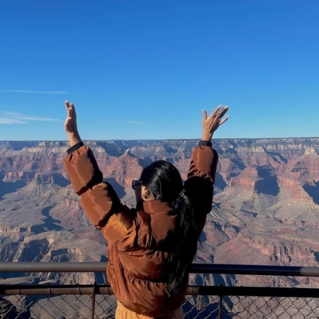 Tealwheeltours Woman Raising Her Arms By Canyon