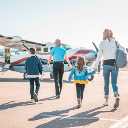 Westwindairservice A Family Walks Towards Small