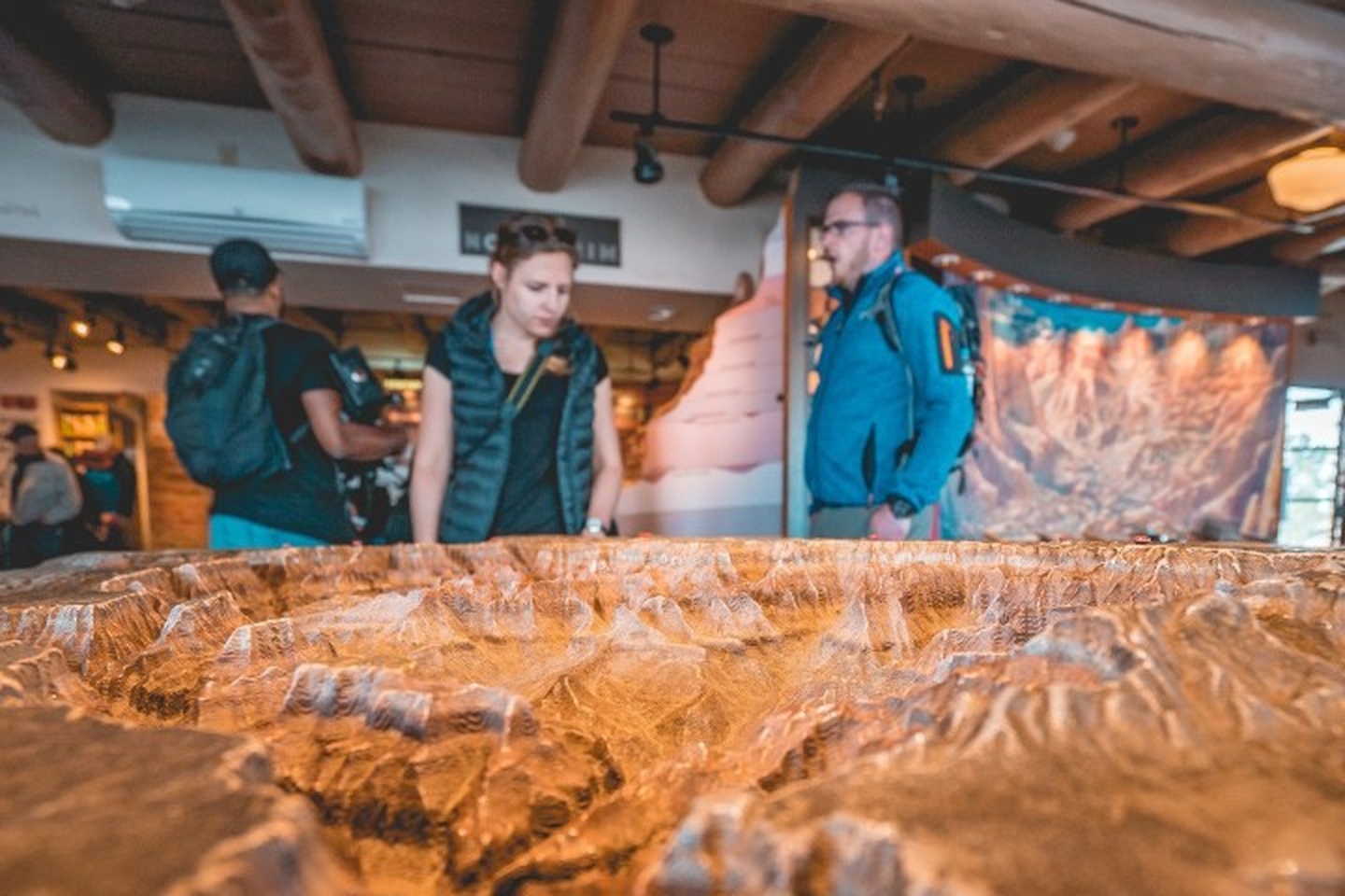 westwindairservice-visitors-examining-a-scale-model_upscaled Westwindairservice Visitors Examining A Scale Model Upscaled