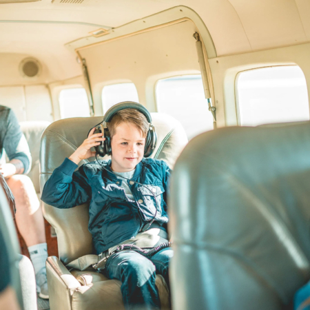 Westwindairservice Young Boy Listening To Music Small