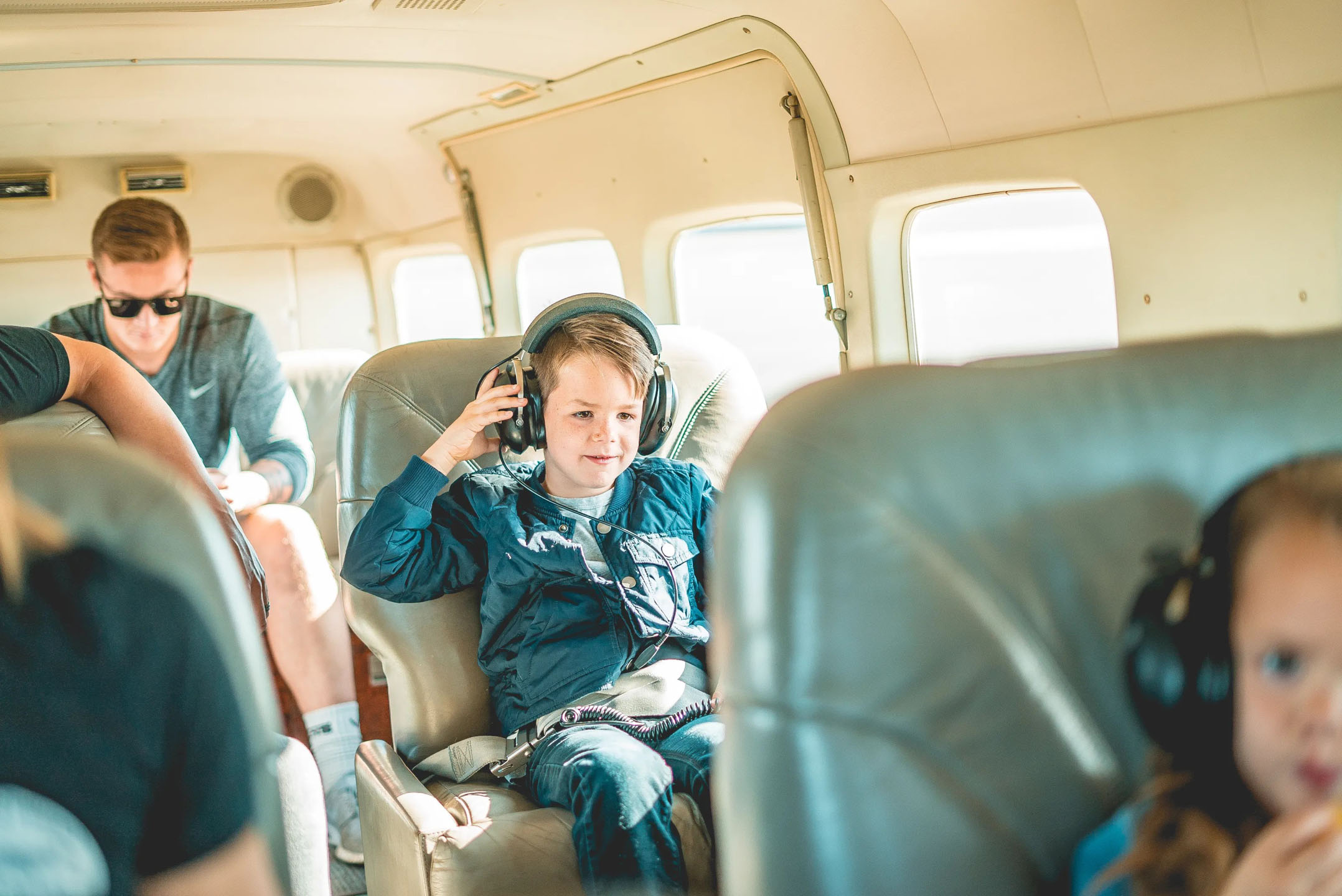 westwindairservice-young-boy-listening-to-music-small Westwindairservice Young Boy Listening To Music Small