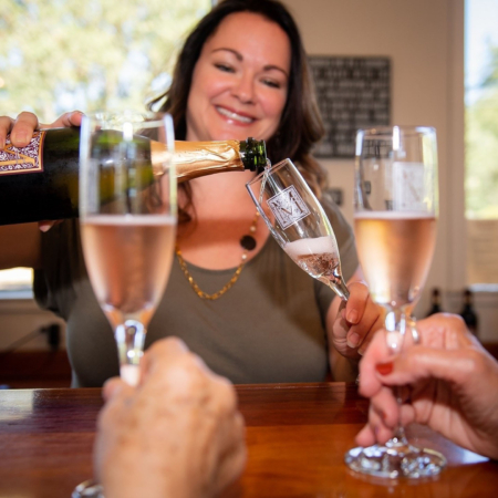 Yosemite Tours Pouring Sparkling Wine For A