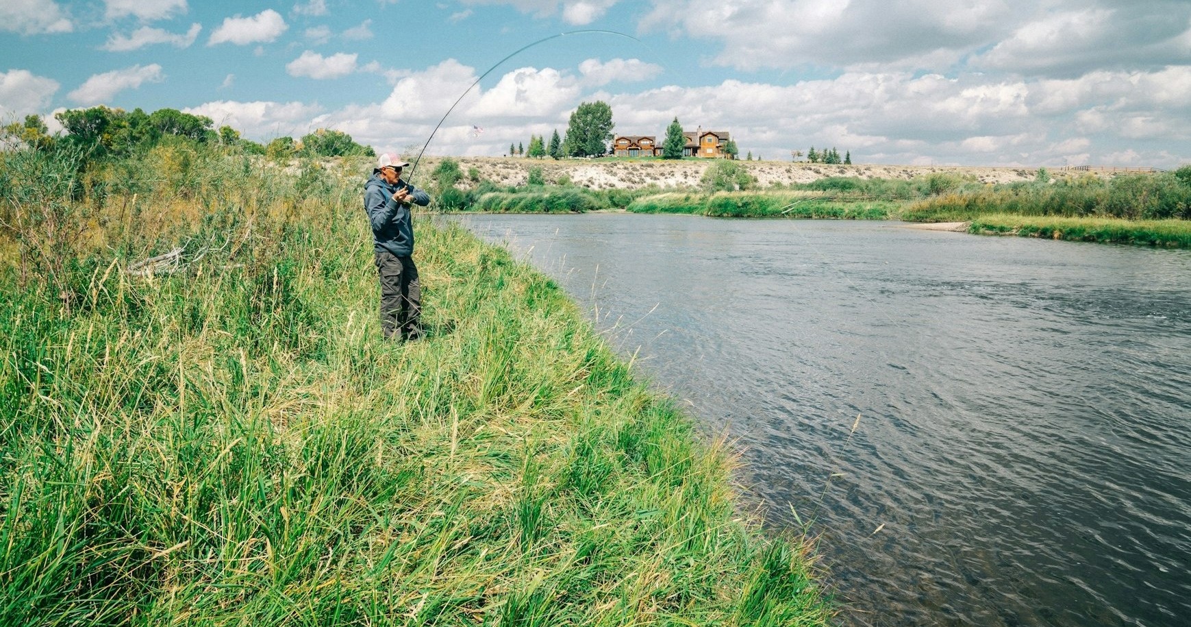 anglessports_guided-fly-fishing-trip-fly-fishing-from-bank-river