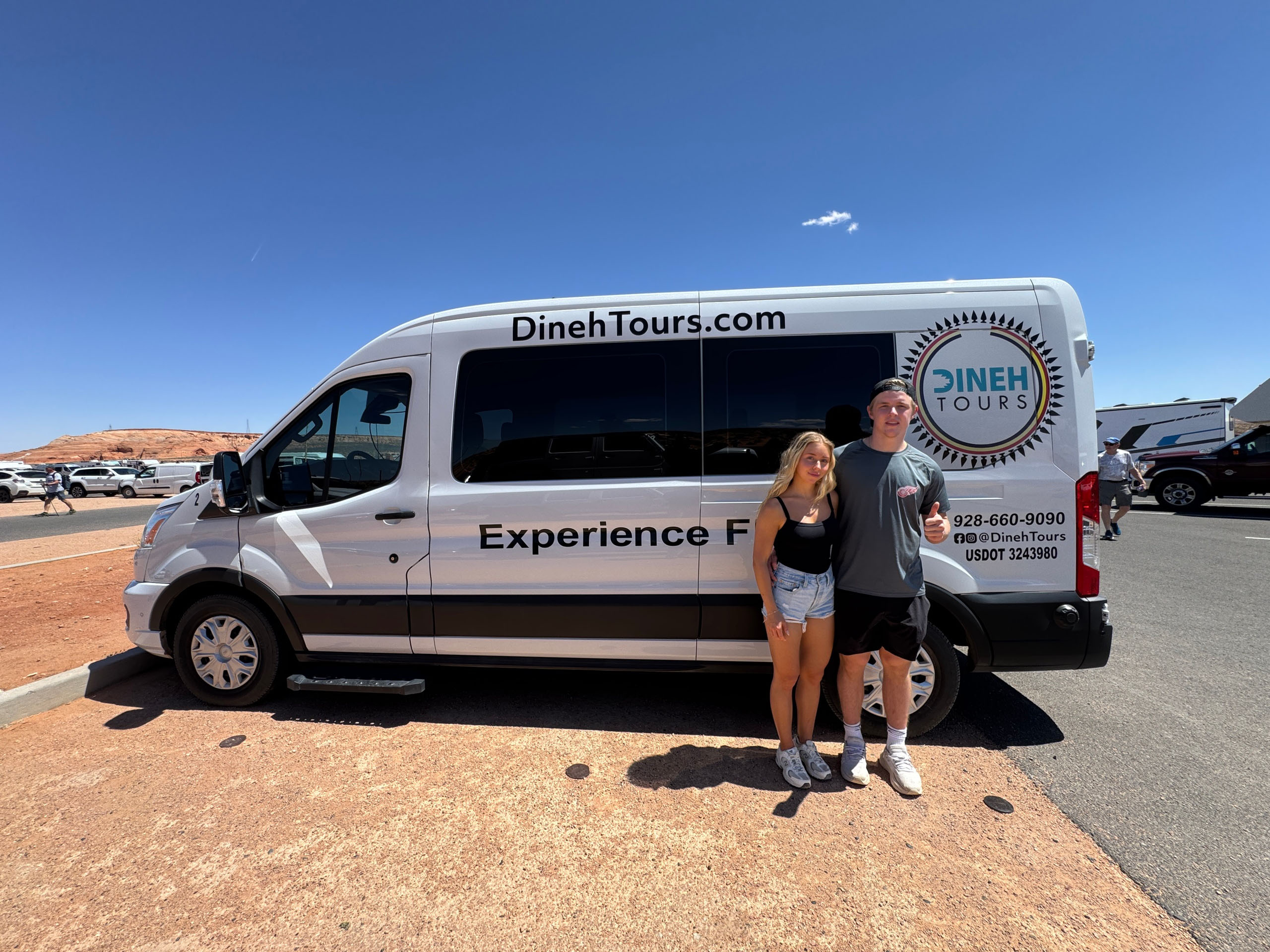 dinehtours_ultimate-trifecta-of-upper-antelope-cany-tour-van-couple-parking-lot