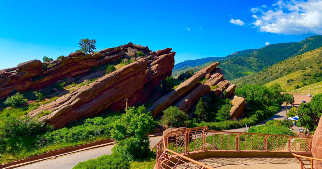 explorerdenvertours_denver-foothills-tour-red-rocks-mountains-greenery-sky