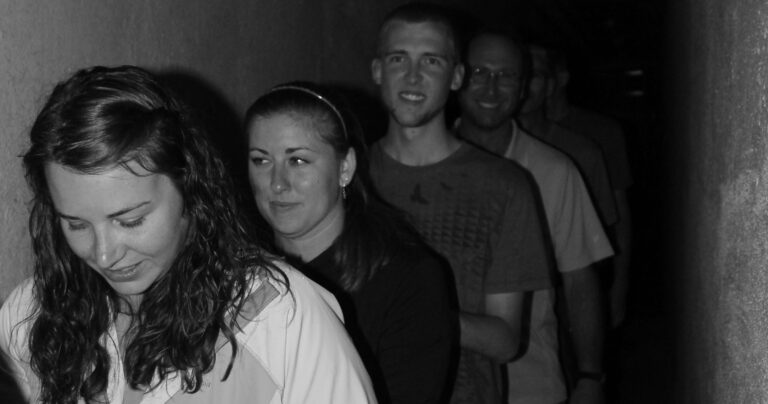 fortcollinstours_the-fort-collins-ghost-tour-ghost-tour-group-narrow-hallway