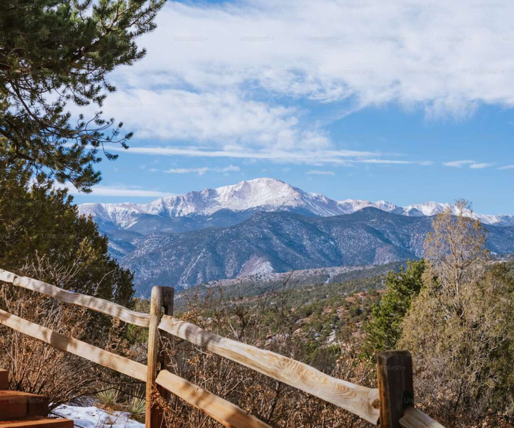 gobirdingman_high-country-hike-and-hot-spring-soak-snow-capped-mountains-fence