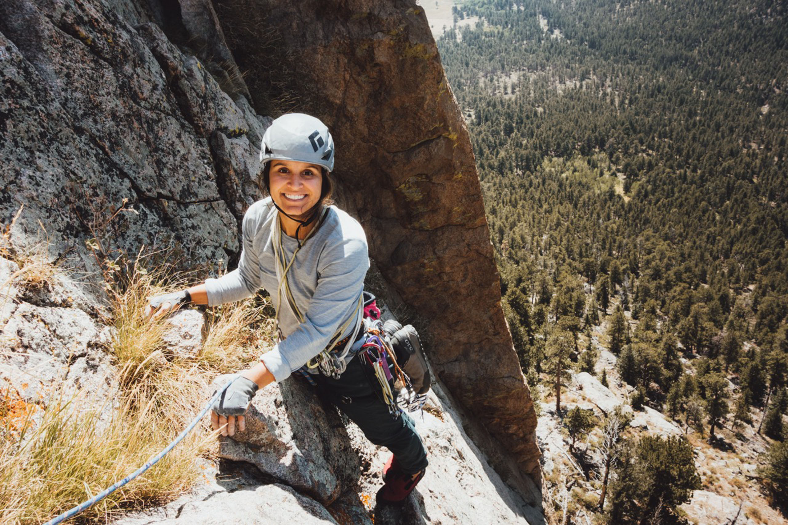 kmaconline_6-hour-rock-climbing-rock-climber-sunny-mountain-side