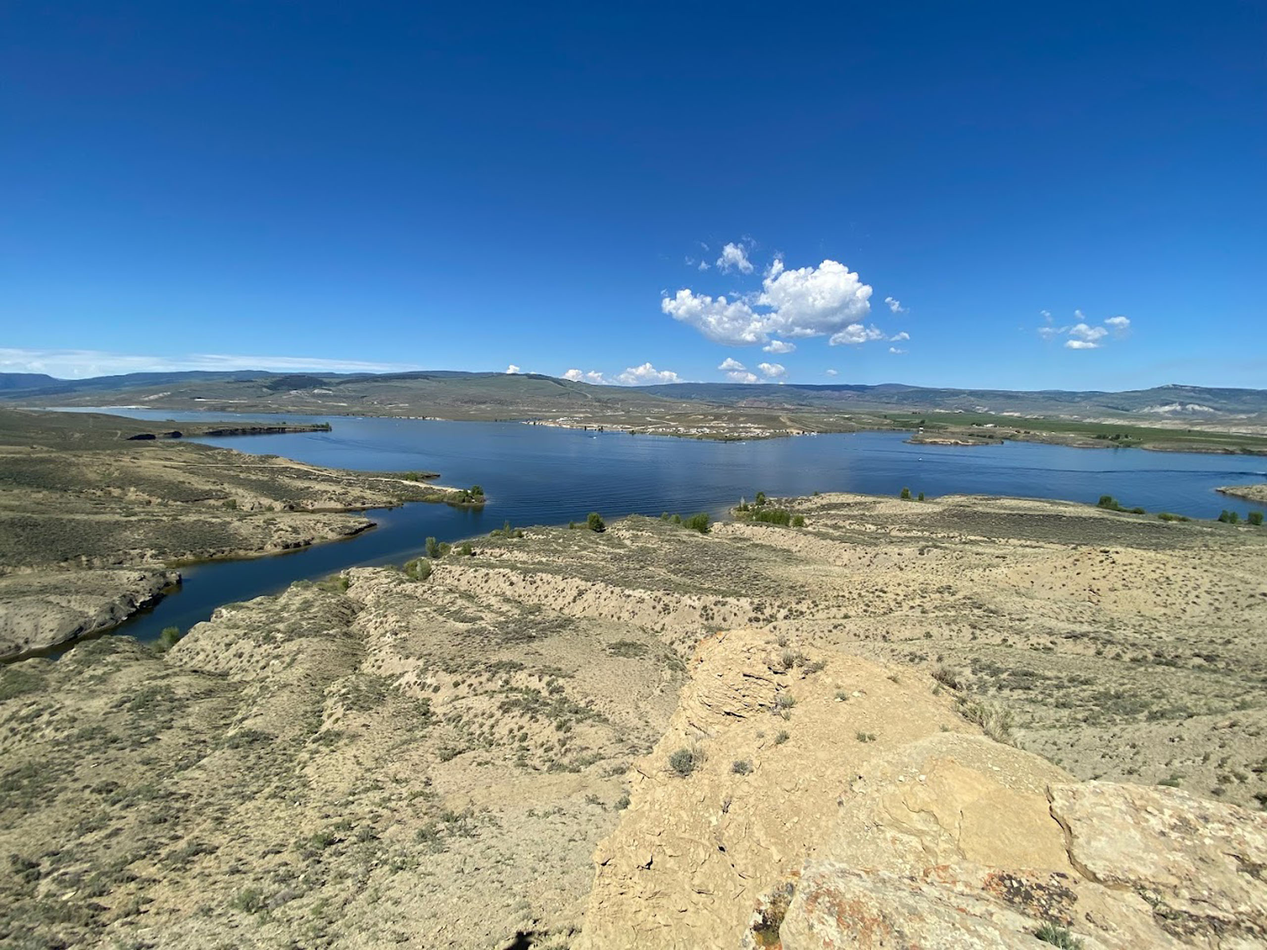 mysnowmobiletour_kremmling-guided-atv-utv-tours-lake-rocky-landscape-clouds