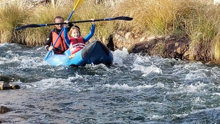 oactours_polar-bear-float-winter-kayak-tour-kayakers-blue-kayak-river